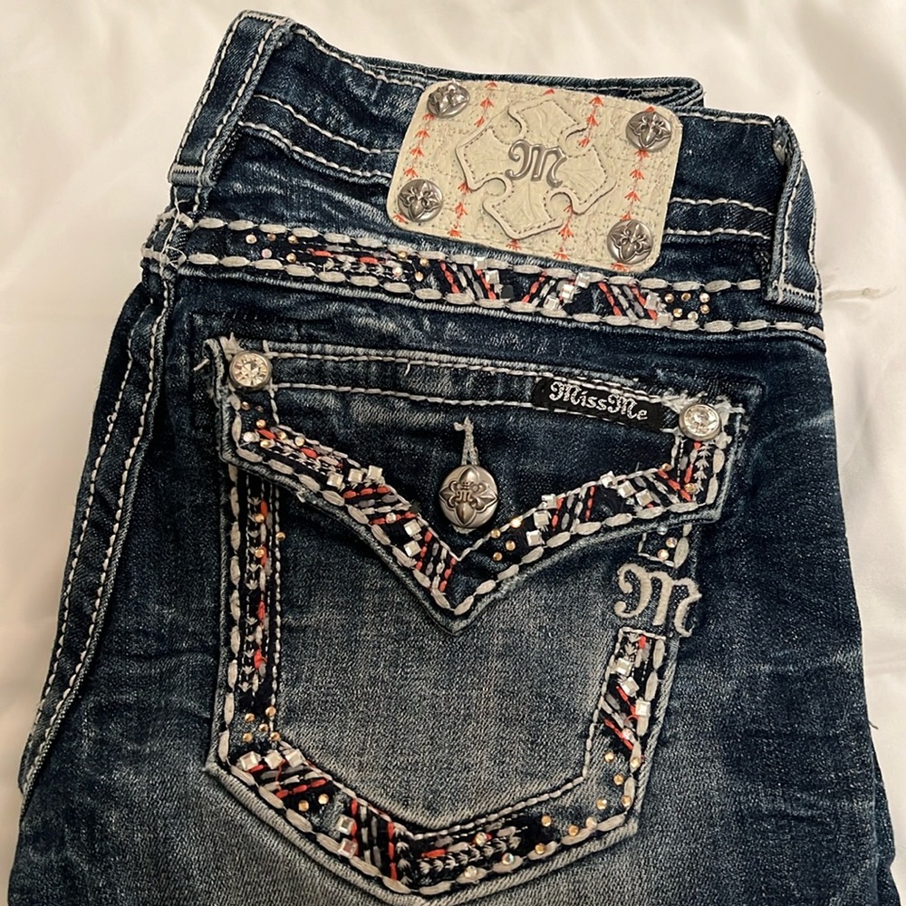 Miss Me straight cuffed distressed jeans.